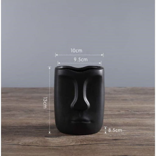 Fioriera Con Piedistallo Testa Nera Dell'isola Di Pasqua