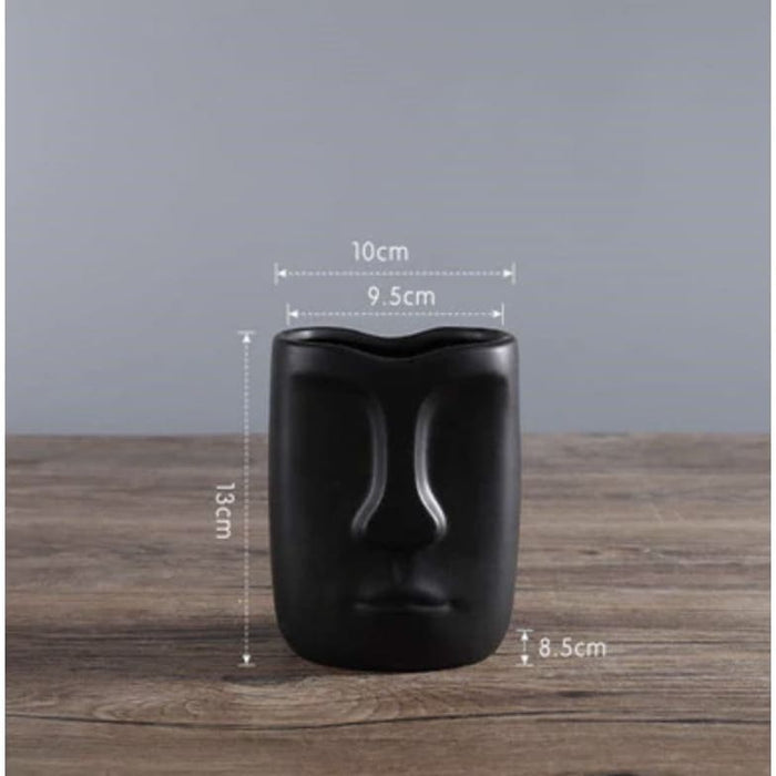 Fioriera Con Piedistallo Testa Nera Dell'isola Di Pasqua