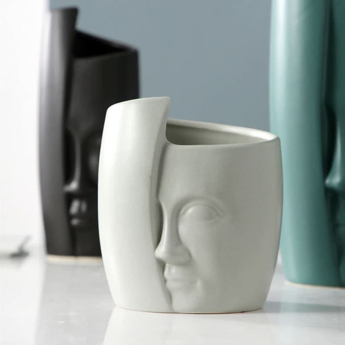 Fioriera Bianca Con Faccia Nascosta